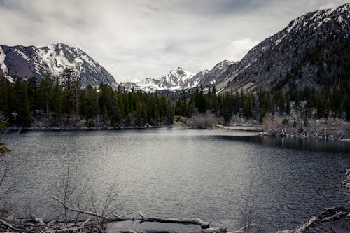 Free Body of Water Surrounded With Mountains Stock Photo