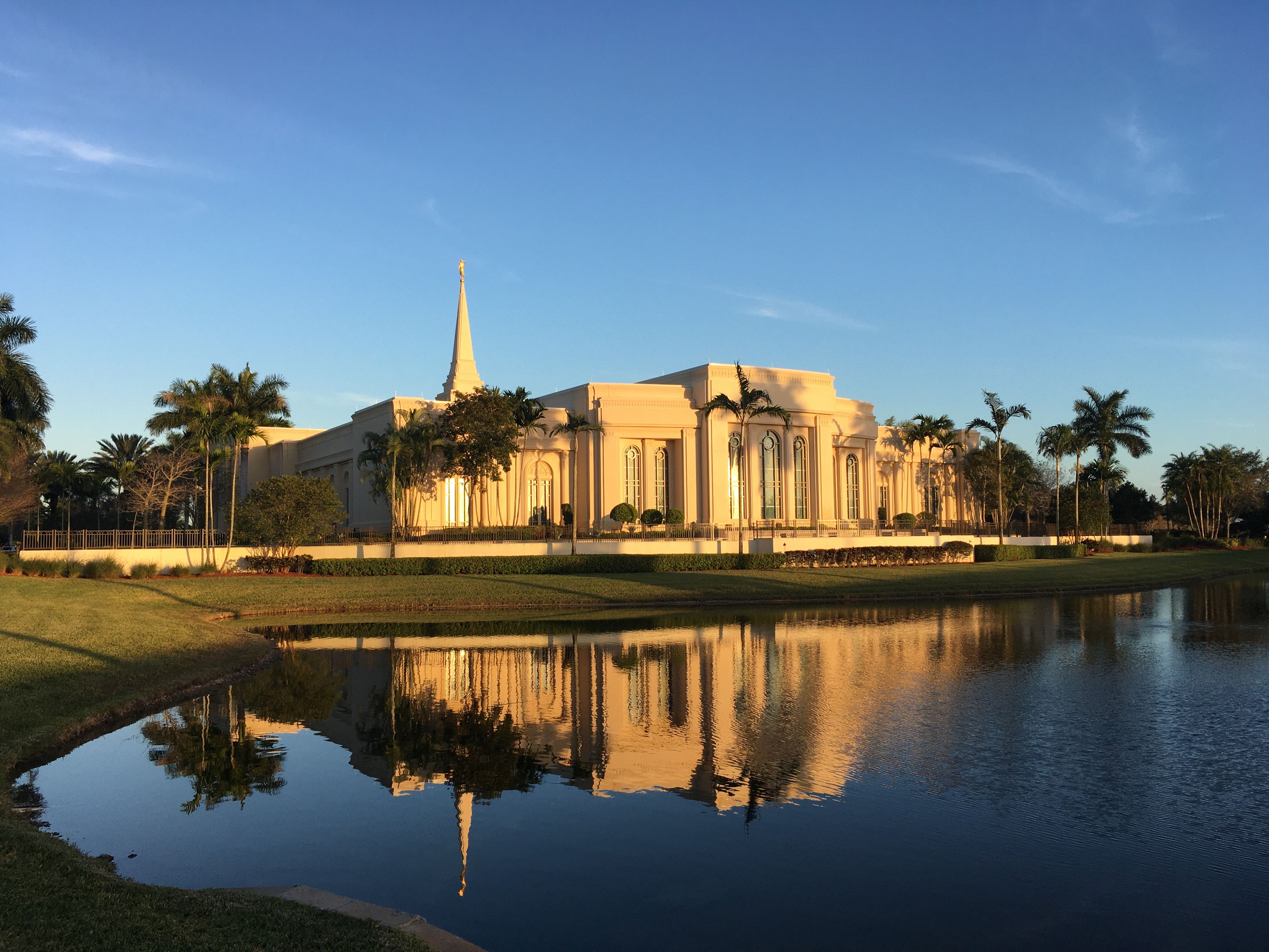 Davie: Fort Lauderdale Florida Temple reflected in a pond in Davie