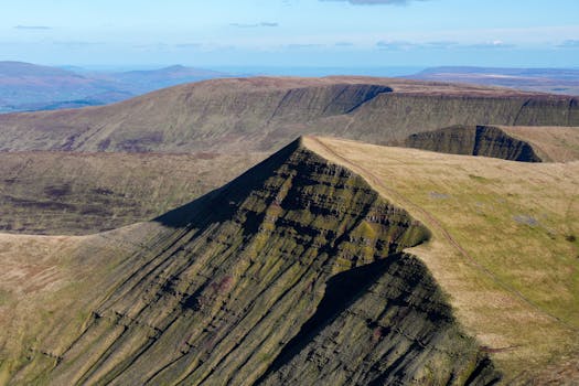 Breathtaking aerial view of the iconic cliffs in Brecon Beacons National Park, Wales.