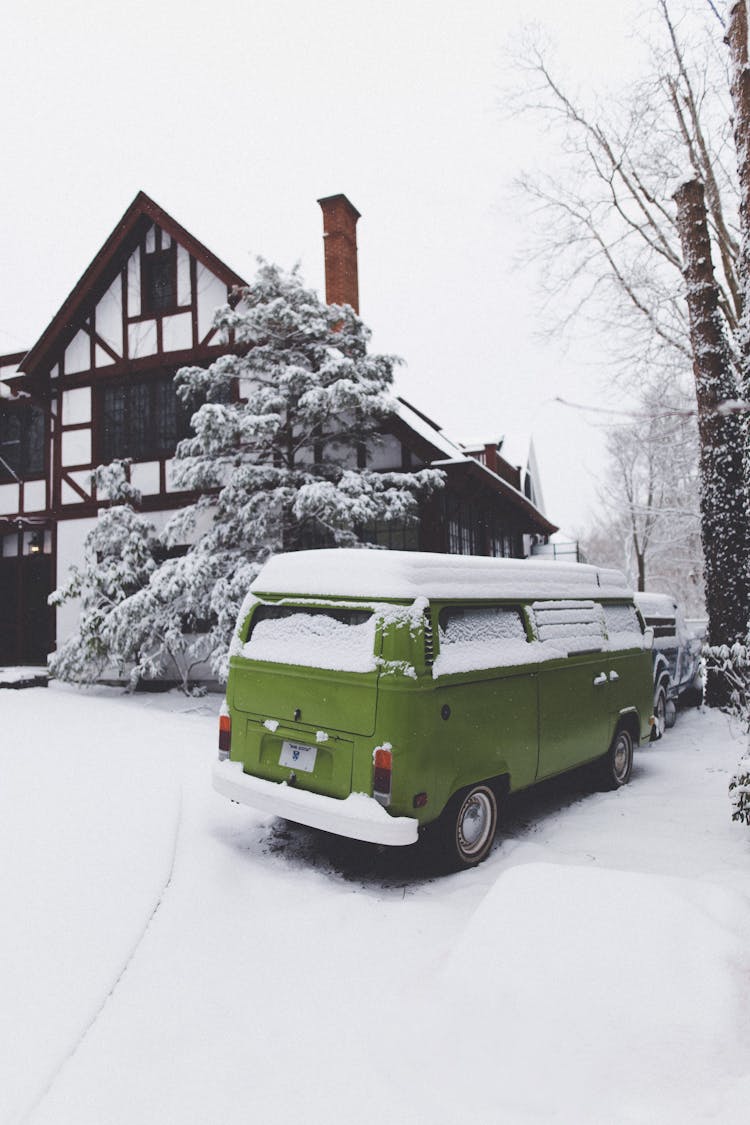 Green Bus Parking At House In Hanseatic Style