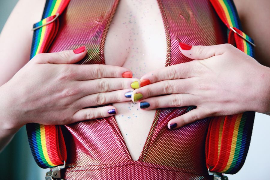 Hands with colorful polished nails