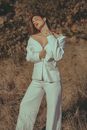 Fashion Female Model Exposing Neckline and Shoulders