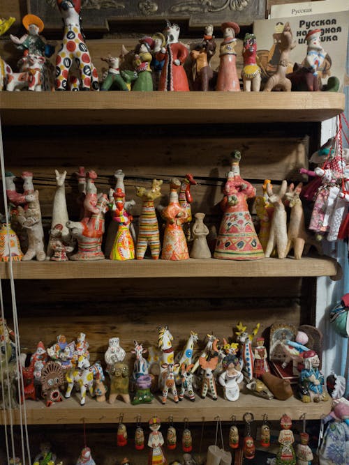 Photo of Figurines on Shelves 
