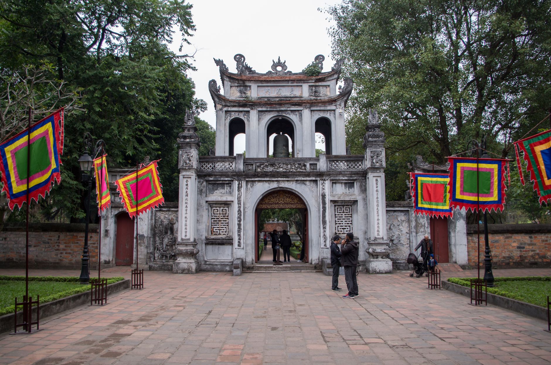 The main gate of the Temple of Literature in Hanoi, hung with festival flags