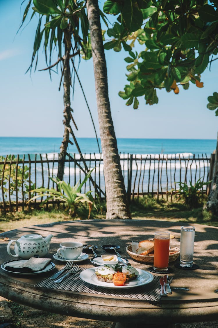 Breakfast Served On Table Overlooking Ocean