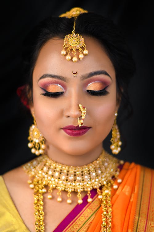 Close-Up Shot of a Beautiful Woman in Traditional Clothing