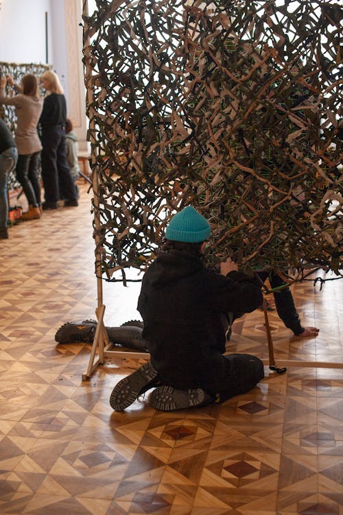 People Making Masking Nets