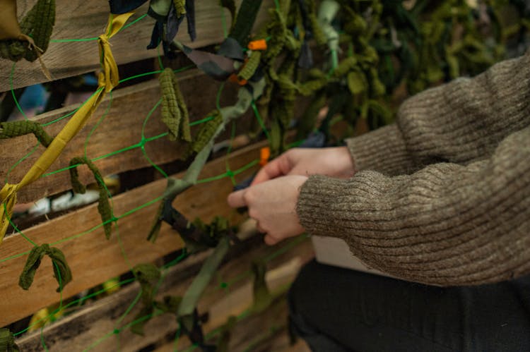 Woman Making Camouflage Nets 