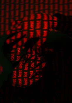 Red and Black Textile on Brown Wooden Table