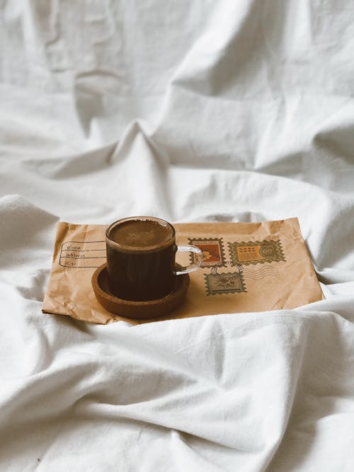 Free Chocolate Drink on Top of a Brown Envelope Stock Photo
