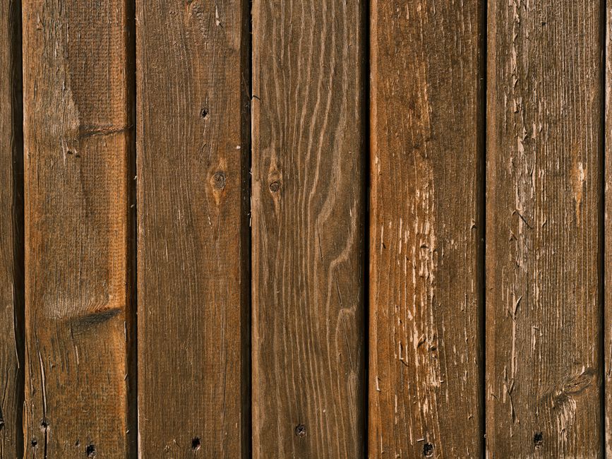 Close-up view of rustic wooden planks with natural grain and texture.