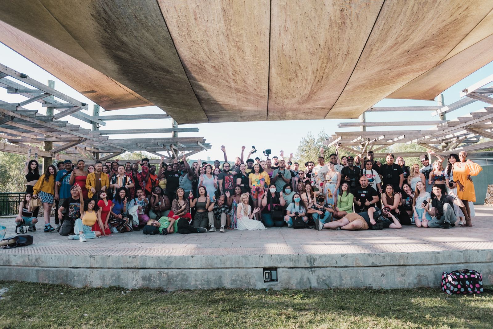 The whole Driftline crew gathered under the shop canopy, photo by Airam Dato-on on Pexels