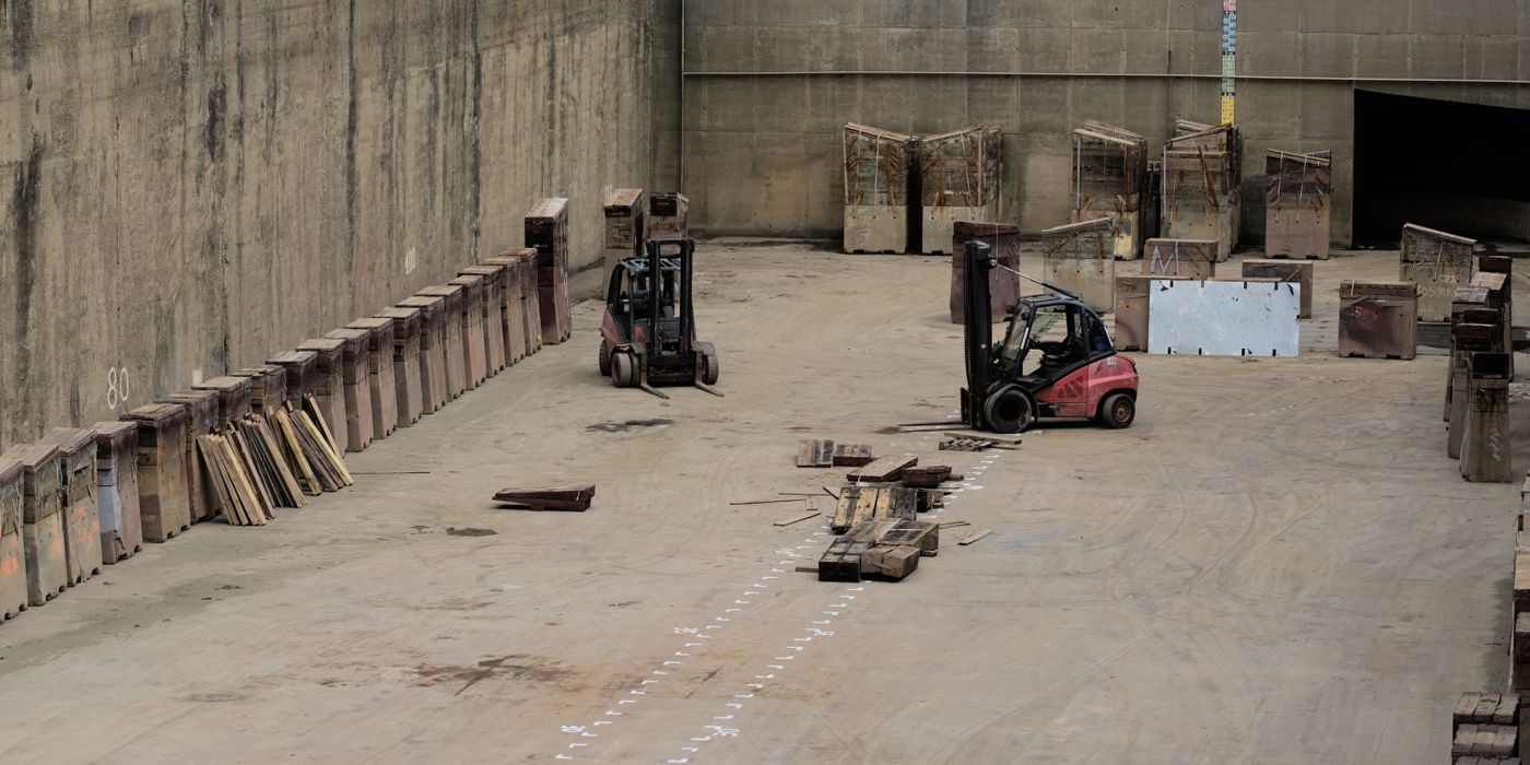 Forklifts operating in large warehouse facility
