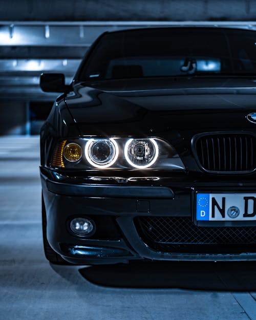 Black Luxury Car Parked at a Garage