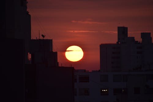 Foto profissional grátis de cair da noite, edifícios, golden sun