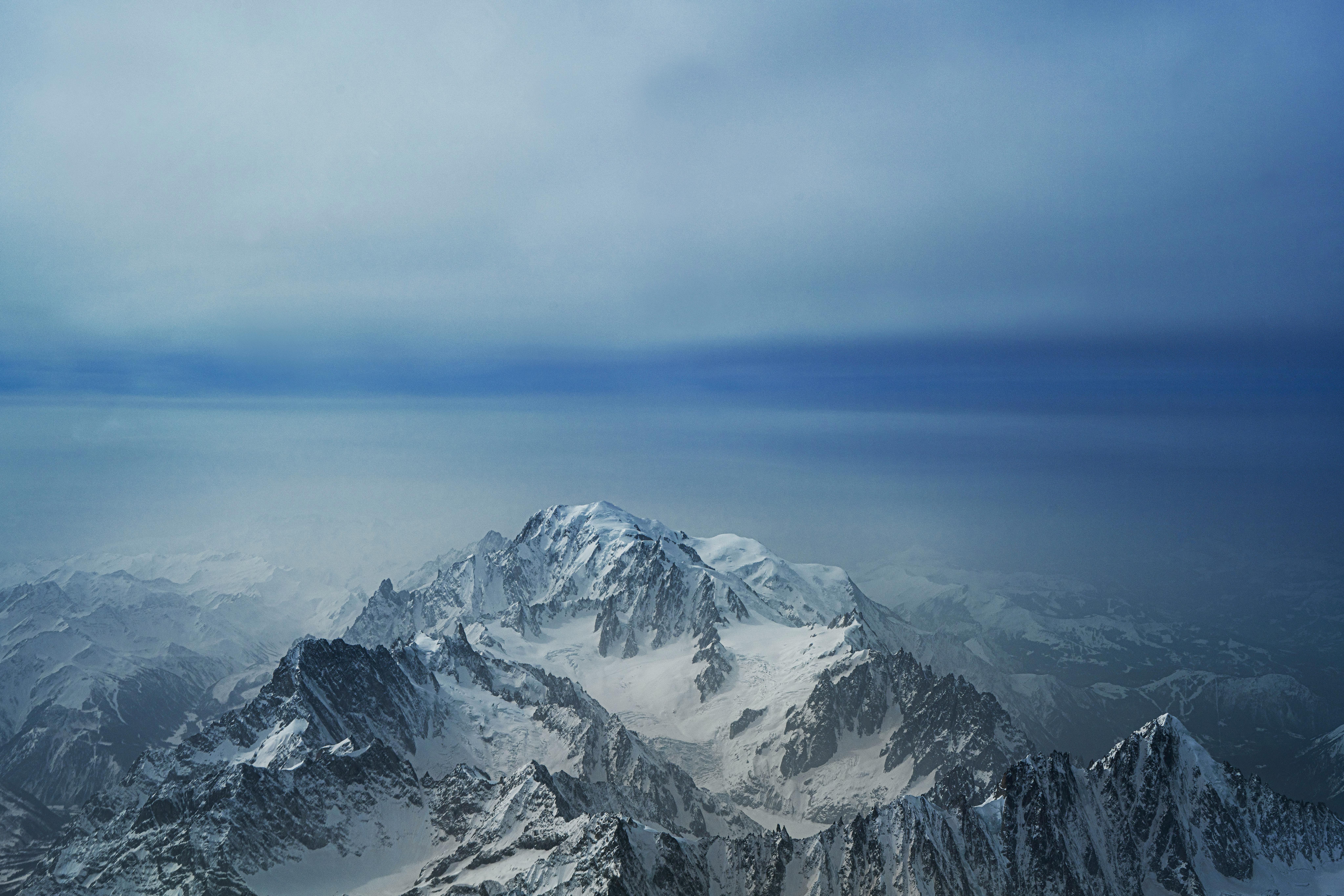 Prescription Goggle Inserts - A stunning aerial view of Mont Blanc covered in snow and ice under a blue sky.