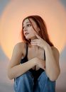 Woman Crouching and Looking Around