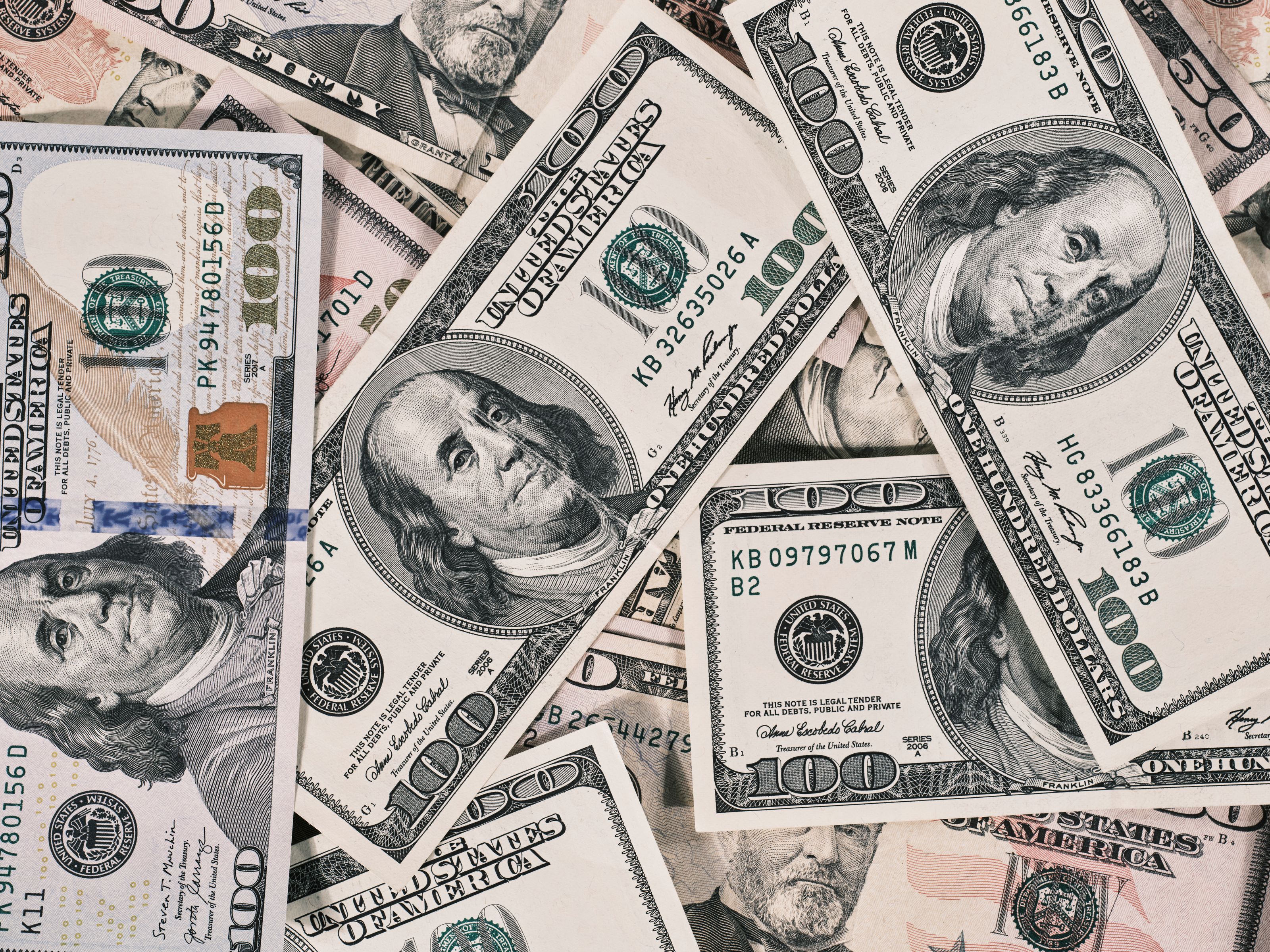 Detailed close-up of US dollar bills highlighting wealth and finance concepts.
