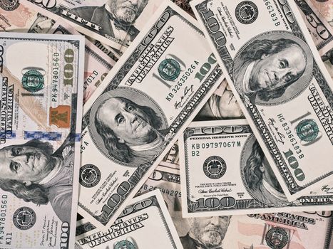 Detailed close-up of US dollar bills highlighting wealth and finance concepts.
