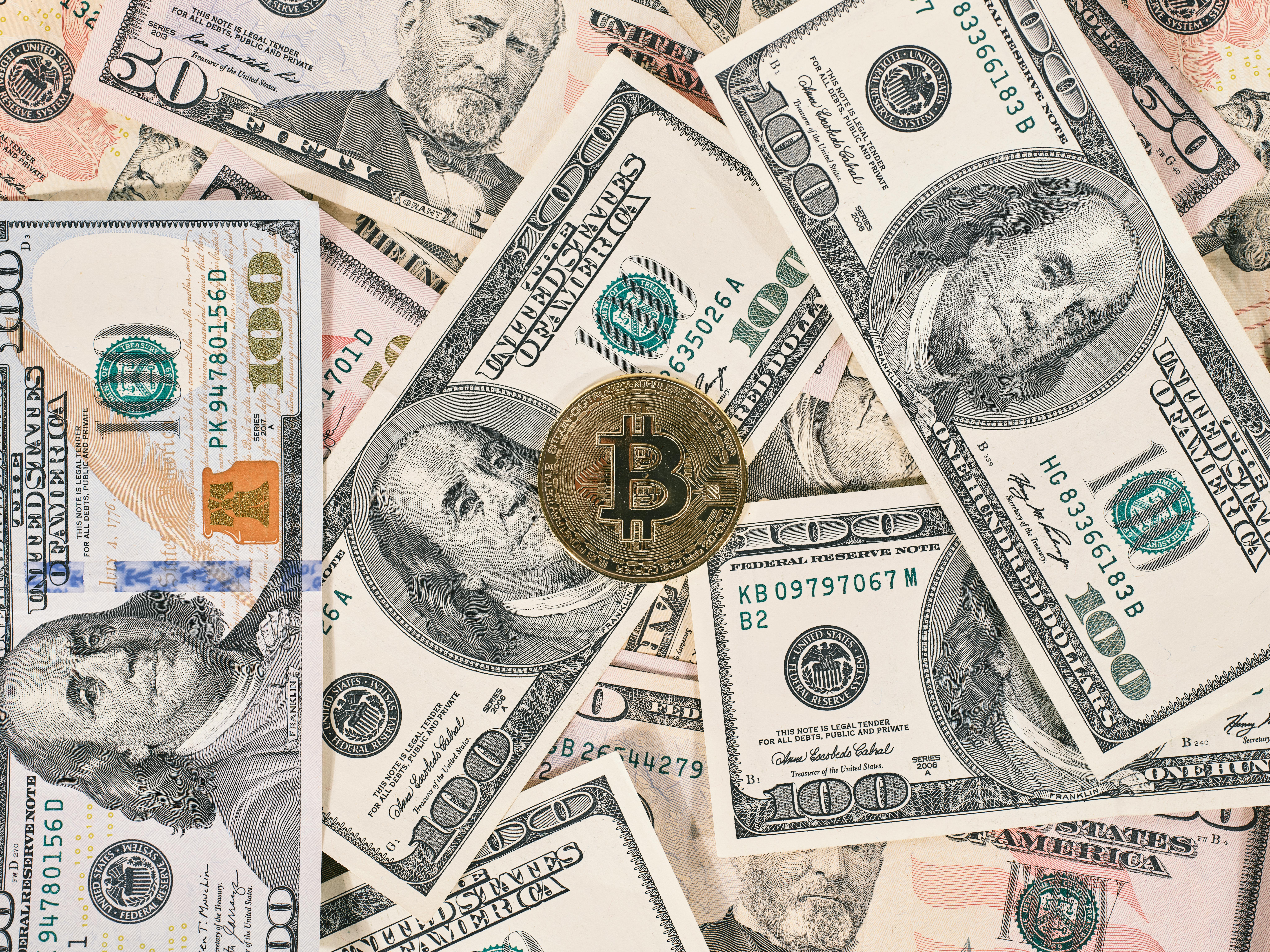 bitcoin on american dollar banknote close up