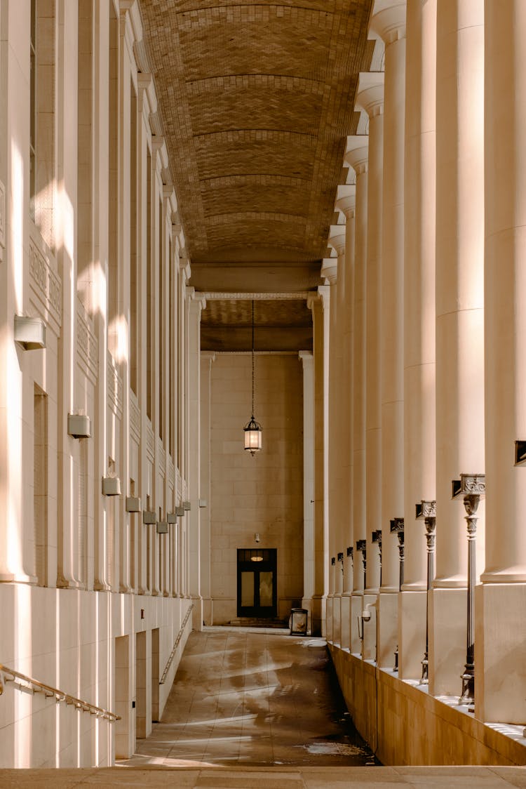 Empty Hallway With Colonnade