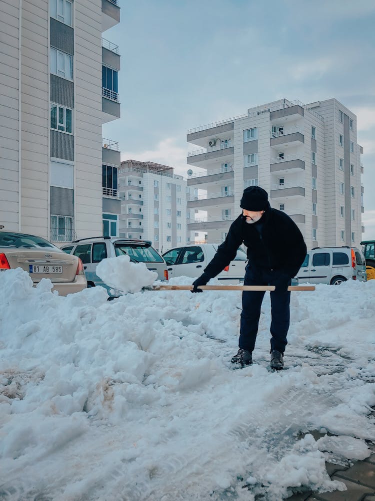 A Man Shoveling Snow 