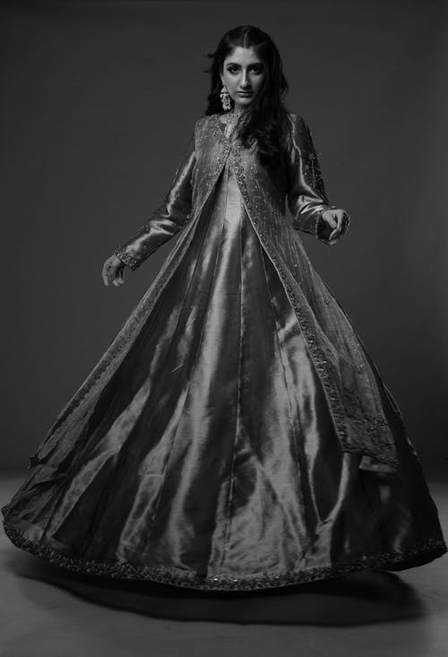Grayscale Photo of Woman Posing in Elegant Silk Long Gown 