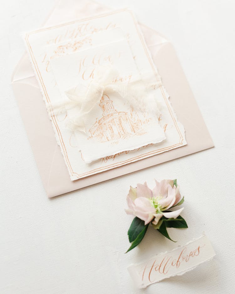 Old White Paper With Envelope And Flower Design