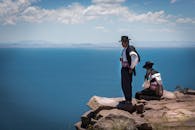 Two Cowboys on Cliff