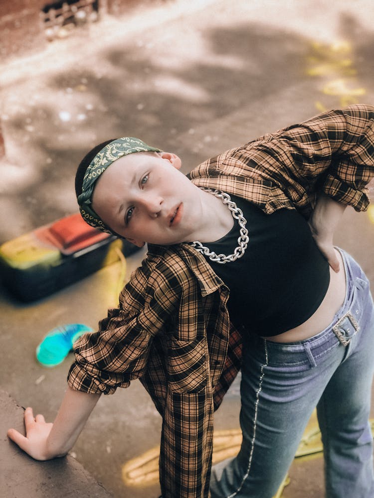 Teenage Girl With Neck Chain Posing