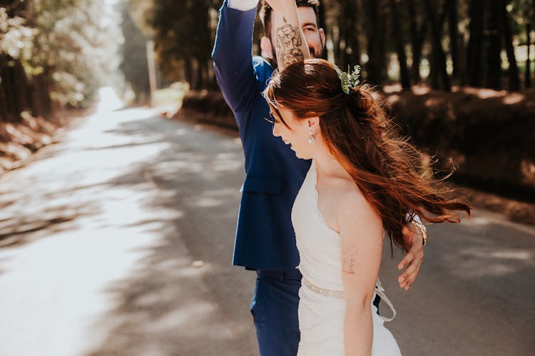 Bride And Groom Dancing In A Street