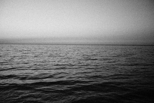 Grayscale Photo of the Sea 
