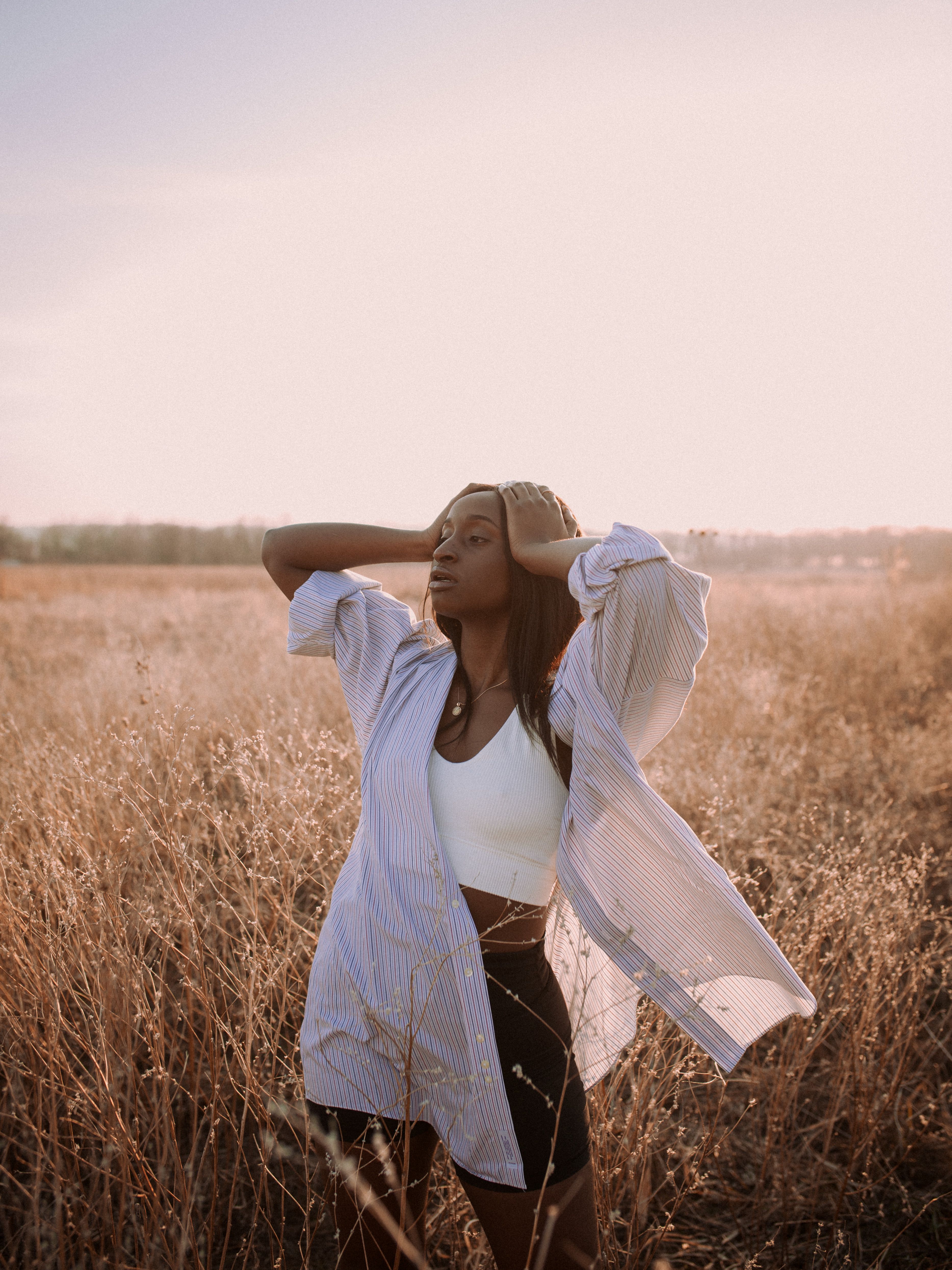 Girl in White Dress Standing on Green Grass Field · Free Stock Photo