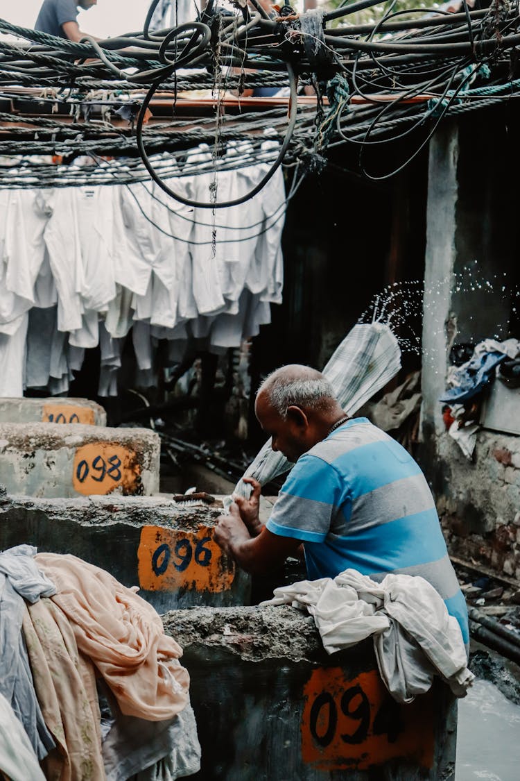 A Man Washing Clothes