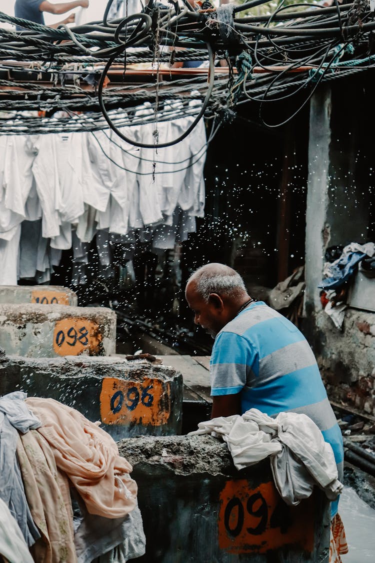 Senior Man At Indian Hand Wash