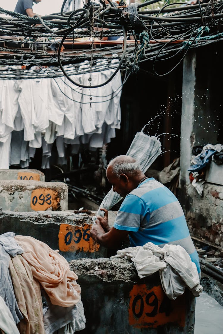 A Man Washing Clothes