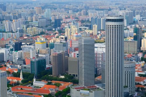 Free Aerial view of Singapore's vibrant and modern skyline featuring iconic skyscrapers. Stock Photo