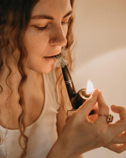 A Woman Smoking Pipe 