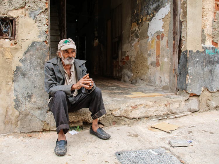 Old Man Looking Pensive Sitting Street Sidewalk