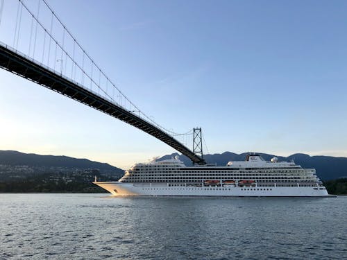 Cruise Ship Passing Under Lions Gate Bridge in Vancouver Canada