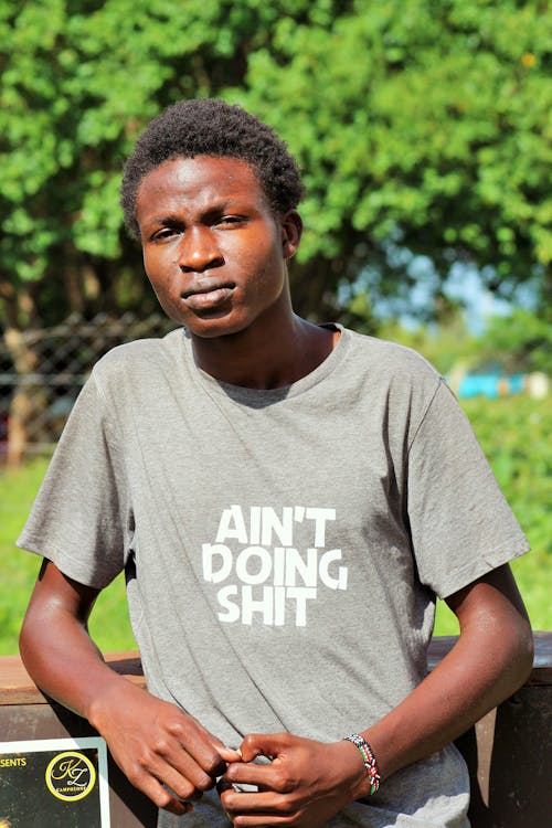 Free stock photo of african boy, ain t doing shit, blur