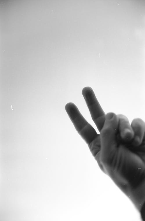 Grayscale Photo of a Peace Sign