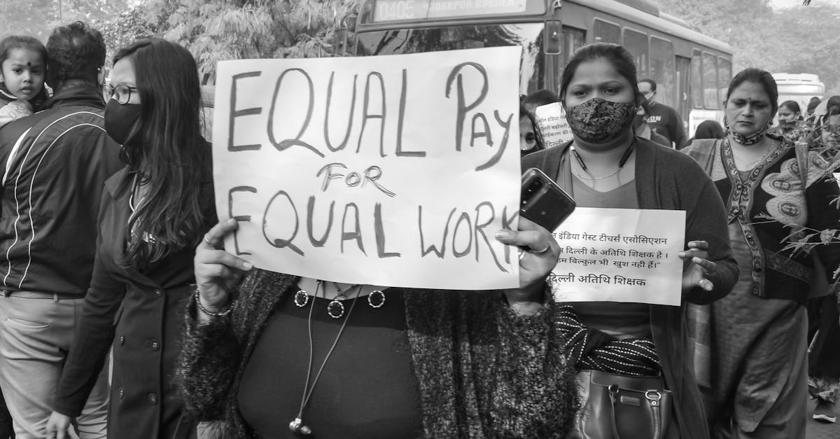 People Holding Protest Signs during a Demonstration · Free Stock Photo