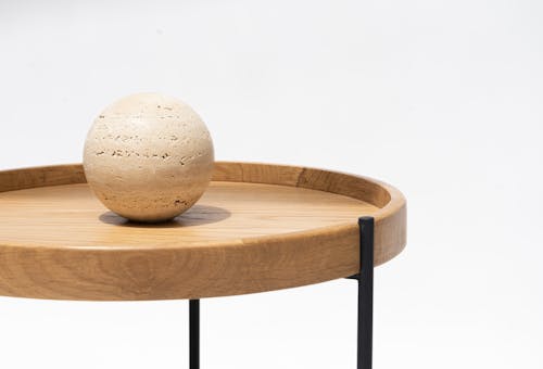 Wooden Coffee Table with a Decoration in a Ball Shape 