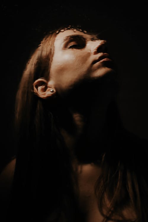 Portrait of Young Woman with her Face Turned Upwards 