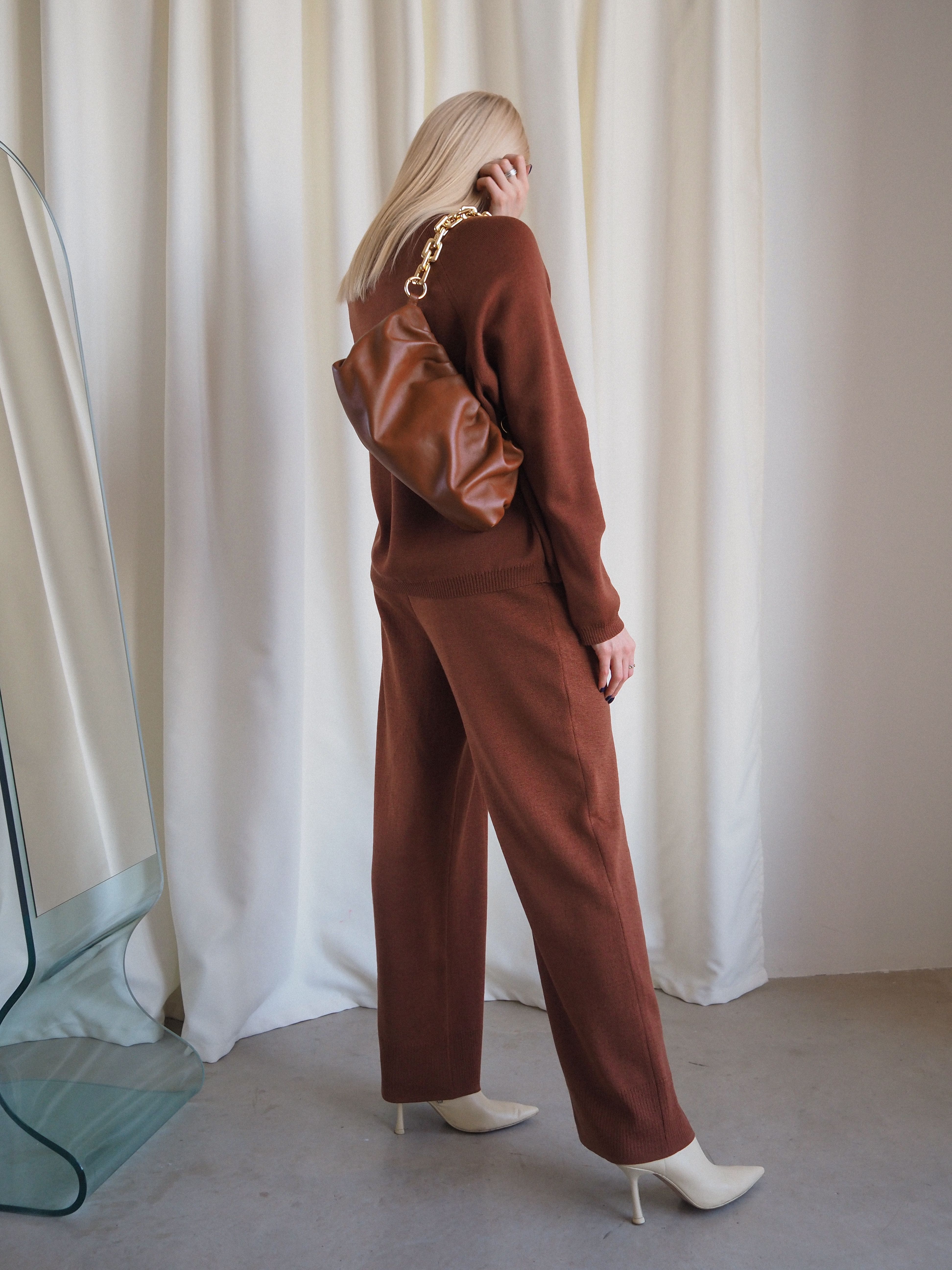 Woman in Brown Clothes Wearing Heels  Free Stock Photo