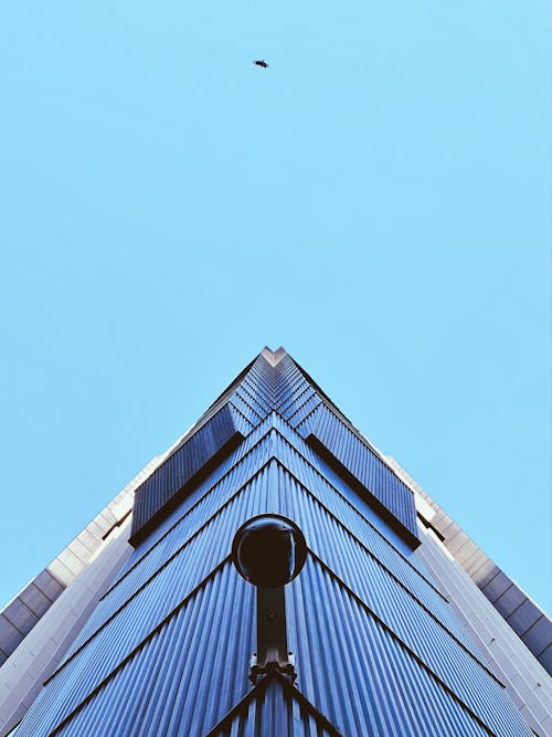 Modern Geometric Building on Blue Sky