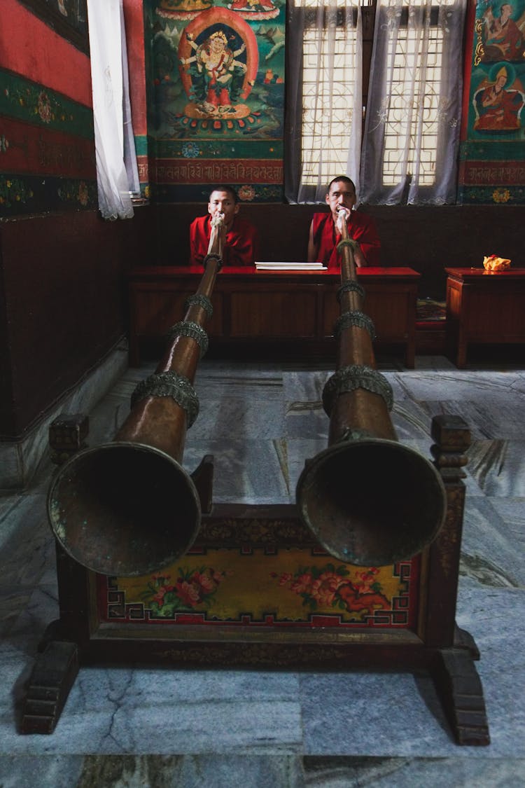 Tibetan Monks Playing Traditional Long Trombones