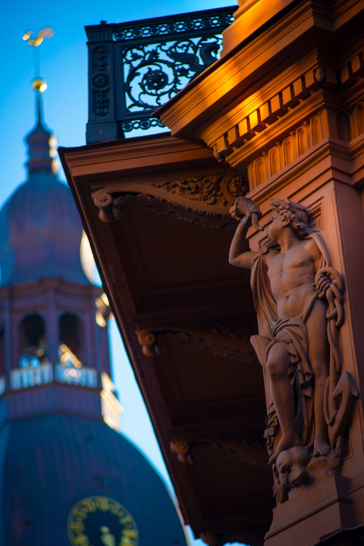 Art Sculpture On Old Building At Night