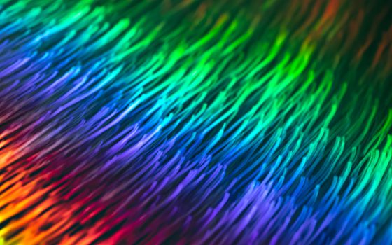 Colorful abstract texture with flowing rainbow stripes, creating a dynamic and vibrant visual display.